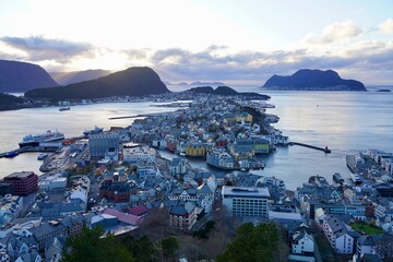 Stunning view of the port city of Aalesund, Norway, with the island of Godoeya in the background....