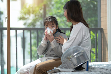 Fencing athlete, mother takes care of her daughter  by giving her milk to drink, caring for growing...