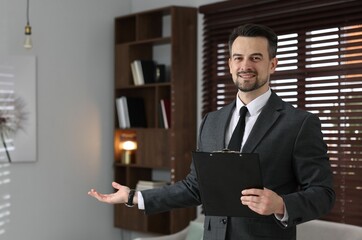 Professional psychologist with clipboard inviting to his office. Space for text