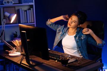 Young beautiful Asian businesswoman taking break with stretching body with ache symptom for...