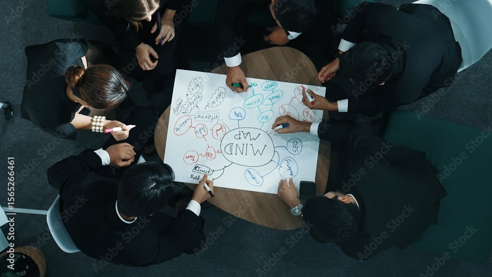 Aufkleber top down aerial view of group of smart diverse business people brainstorm marketing idea while writi