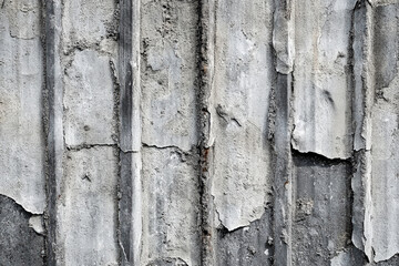 Wall with a lot of cracks and holes
