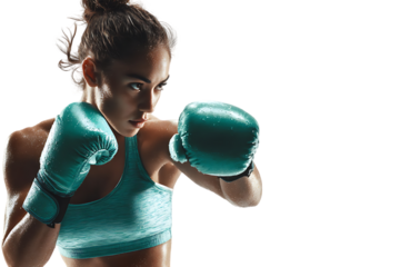 Female boxer in teal gloves, powerful stance.