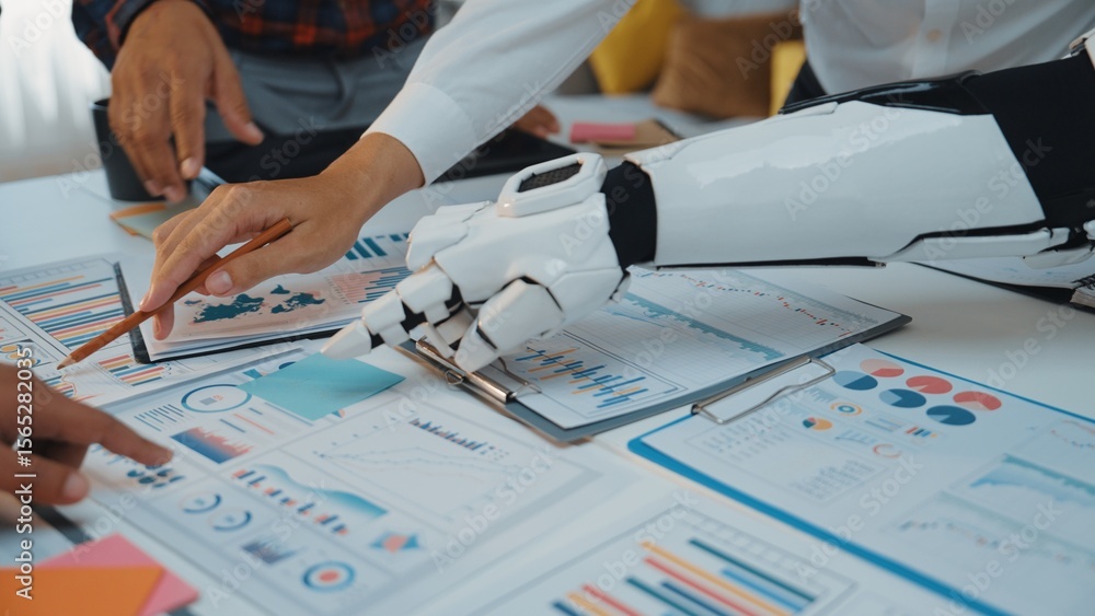 Poster a robotic hand assists team members in a vibrant office environment, analyzing data and developing s