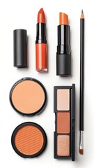 Collection of orange hued makeup products and a makeup brush on white background