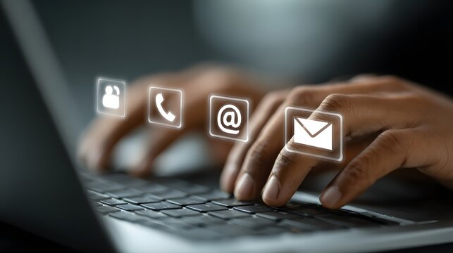 Contact Options: Person Typing on Laptop with Digital Contact Icons