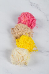 Turkish Pismaniye. Light halva, sweet cotton in the form of threads in a ball. With the aroma of...