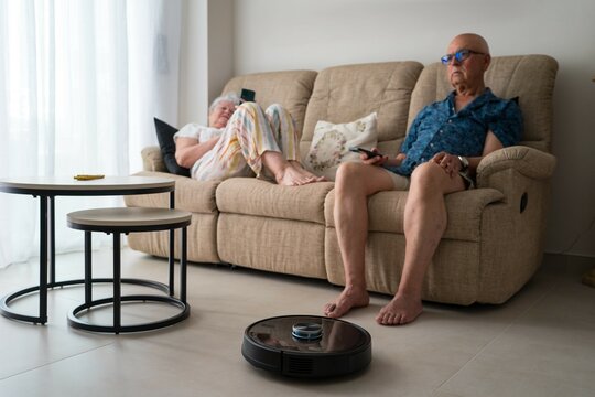 Senior couple interacting with smart home technology