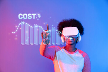 A young individual experiences virtual reality while interacting with a cost reduction graph,...
