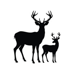 Silhouette of a mature stag standing next to a young deer fawn