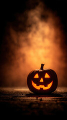Spooky jack-o-lantern glowing in the dark with fog and a witch silhouette for Halloween celebration