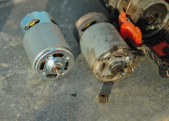 old and new electric screwdriver motor. Replacing the DC motor of a cordless screwdriver