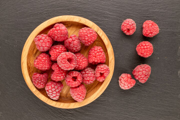 Sweet fresh raspberries, macro, top view.