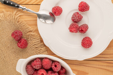 Sweet fresh raspberries, macro, top view.