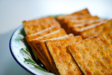 Closeup, Light snack, a plate of cookies on a white background