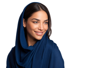 Beautiful young Middle Eastern woman wearing a blue hijab. Studio portrait celebrating modern Arab beauty, culture, and modest fashion