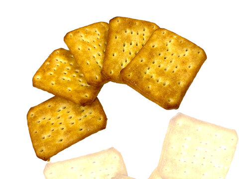Golden crispy and crunchy biscuits isolated on white background