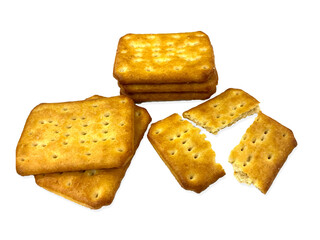 Stack of multiple golden crispy biscuits isolated on the white background