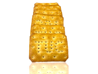 Stack of crispy golden cookies isolated on the white background looking so yummy and delicious