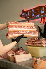 Meat on the counter. Selection of raw meat, piece of pork. BBQ selection, shashlik, meat tenderloin, fillet.