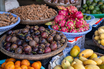 Local market with exotic fruits in Vietnam, Nha Trang resort.