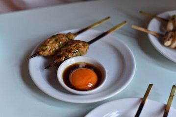 Japanese skewers, yakitori, egg yolk