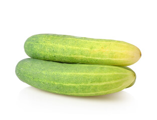 three Fresh cucumbers isolated on white background