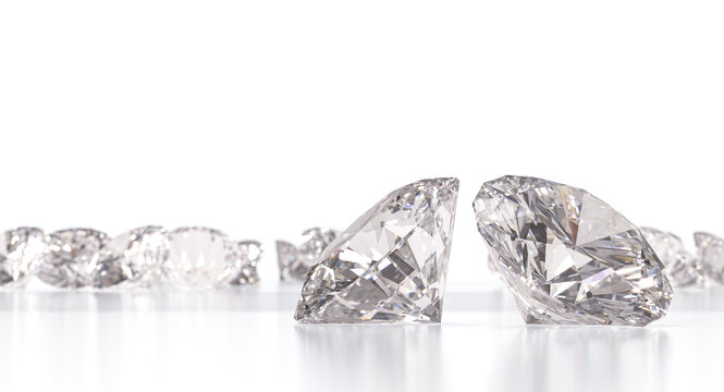 Two large diamonds and  smaller on a reflective white 3d