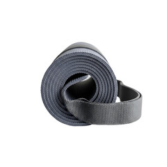 Rolled up exercise mat with carrying strap showing texture and material detail in a close up view on transparent background