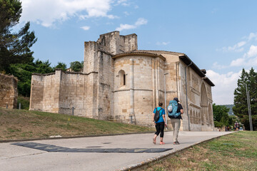 Way of St. James. Pilgrim next to the Church of the Holy Sepulchre in Estella