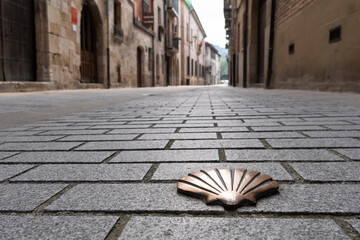 Way of St. James sign on the cobblestones. Estella, Navarre