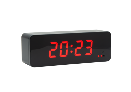 Rectangular dark grey digital LED clock displaying '20:23' in vivid red LED digits with a subtle glow, isolated on a seamless transparent studio background with ample negative space for commercial