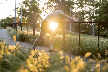 Adult person training outdoors at the end of the day