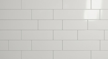 Naklejka premium Wall of light greywhite rectangular tiles in a staggered pattern showing subtle highlights