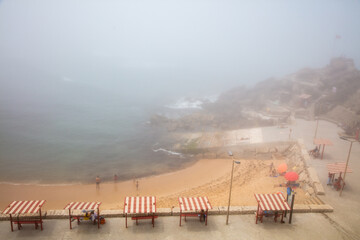 Foggy Summer Morning at Santa Cruz Beach, Torres Vedras, Portugal. July 4, 2025