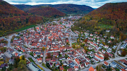 Aerial view of the old town of the city Bad Urach in Germany on a sunny afternoon in autumn