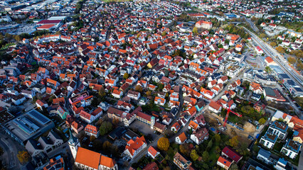 Aerial view of the old town of the city Metzingen
 in Germany on a sunny afternoon in autumn