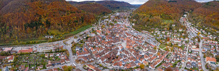 Aerial view of the old town of the city Bad Urach in Germany on a sunny afternoon in autumn