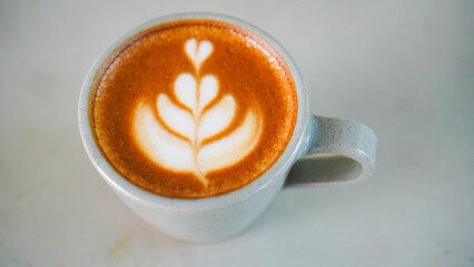 Latte art on a cup of coffee