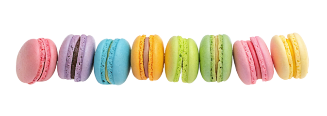 Brightly colored french macarons in a row against a clean crisp pastel background in assorted hues
