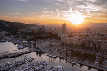 Barcelona Marina: Luxury Yachts and City Lights at Twilight

An aerial view of Barcelona's bustling...