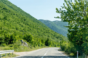Scenic road among mountains Bosnia and Herzegovina, car drive along country road