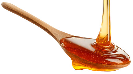 Honey dripping from a spoon isolated on a white background