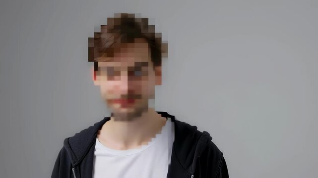 Blurred motion portrait of a young male turning face in casual attire