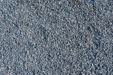 Fotobehang Donkergrijs Overhead view of gray granite pea gravel  © Jason Busa