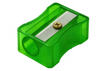 Green plastic pencil sharpener with single blade, resting on transparent surface, showcasing minimalist design and sharp functionality
