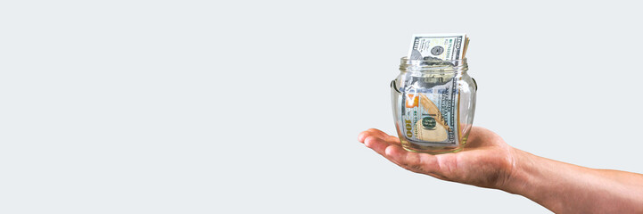 Hand Holding Money Jar: Financial Savings Banner with Copy Space