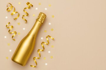 Golden champagne bottle with ribbons and stars for celebration background
