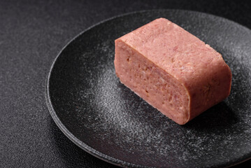 Food, meat, ham sliced in slices for the festive table. Spiced ham