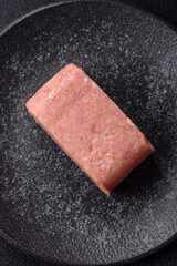 Food, meat, ham sliced in slices for the festive table. Spiced ham